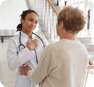 Médica com paciente